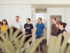 Several colleagues from prodot stand together in a circle